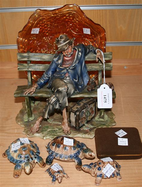 A Capodimonte Porcelain Model Of A Tramp On A Bench A Capodimonte