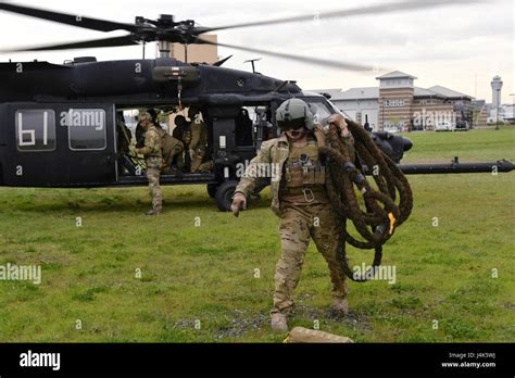 A crew member from the C/4-160th SOAR (Night Stalkers) collects a ...