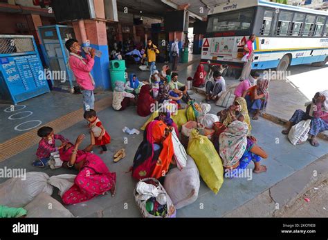 Passengers Wait To Board Buses For Their Native Place After