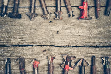 different types of drill bits on old wood background Stock Photo ...