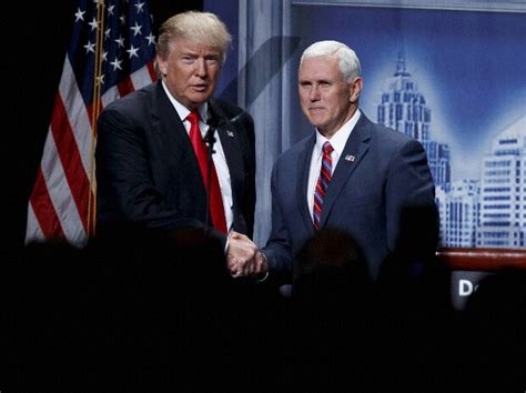 Donald Trumps Crude Remarks Put Running Mate Mike Pence In Awkward Spot Business Standard News