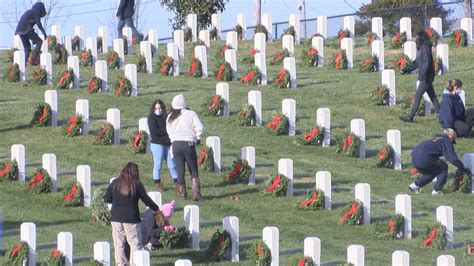 Volunteers Lay Thousands Of Wreaths To Honor Veterans At Mountain Home