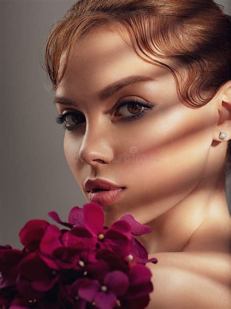Beautiful White Girl With Purple Flowers Stunning Brunette Girl With Big Violet Bouquet Flowers