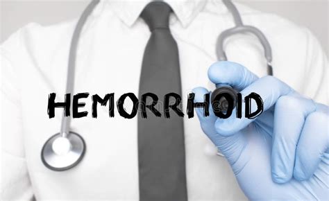 Medicine Concept Doctor Writes The Word Hemorrhoid Stock Image Image