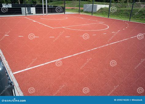 View Of An Outdoor Basketball Court In A Sports Center Rubber Floor