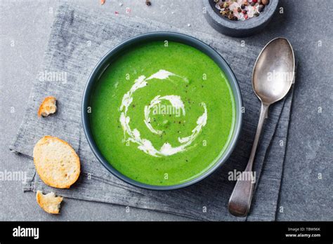 Broccoli Spinach Cream Soup In A Bowl With Toasted Bread Top View Plant Based Diet Stock