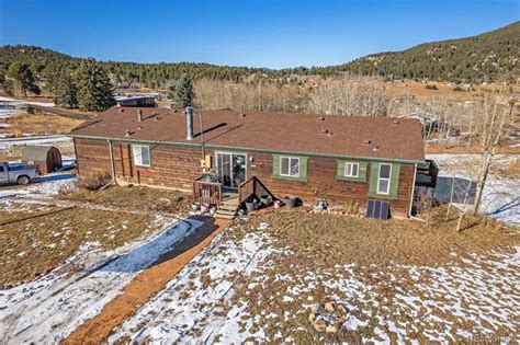 Homes for Sale with a Garage in Conifer, CO | Compass