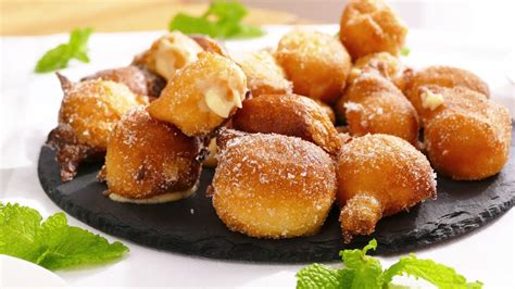 Buñuelos de viento rellenos de crema pastelera receta tradicional de