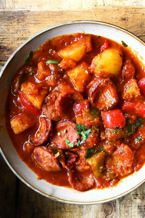 Potato And Sausage Stew Serving Dumplings