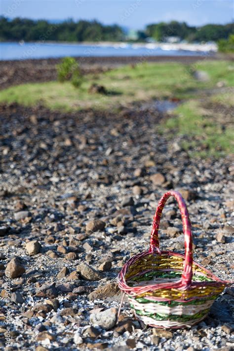 Basket on Beach Stock Photo | Adobe Stock