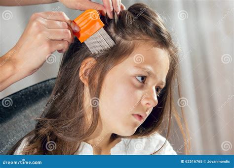 Mother Treating Daughter S Hair Against Lice Royalty Free Stock