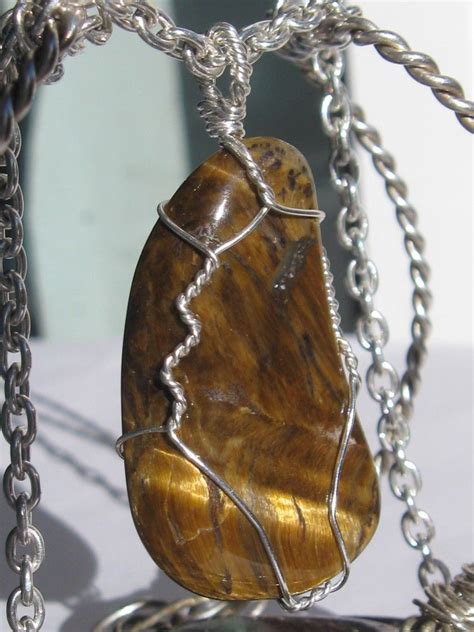 Tiger Eye Stone Pendant Wire Wrapped In Sterling Silver Silver