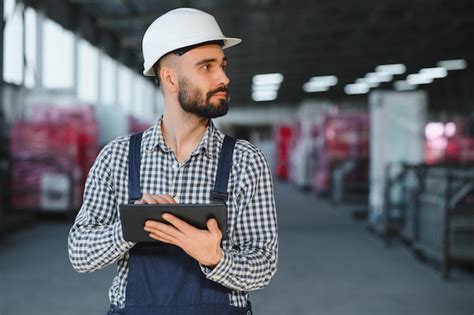 Premium Photo | Warehouse worker guy in warehouse worker uniform