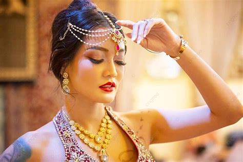 Beautiful Indian Girl In Traditional Attire With Kundan Jewelry Photo