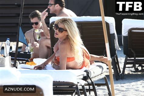 Victoria Silvstedt Lounges Beachside In Miami In An Orange Two Piece Bikini AZNude