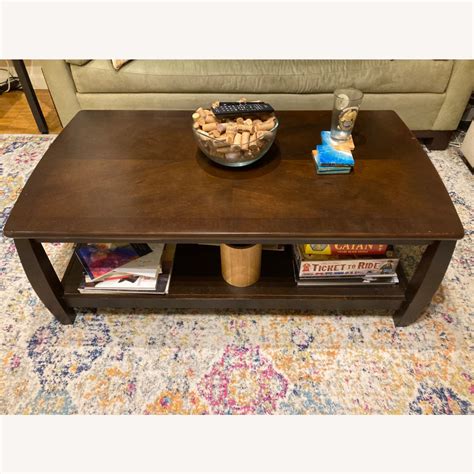 Dark Brown Coffee Table with Storage - AptDeco