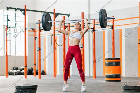 Strong Female Weightlifter Stock Photo