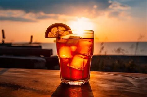 Premium Ai Image Beautiful Summer Sunset With Glass Of Iced Tea And