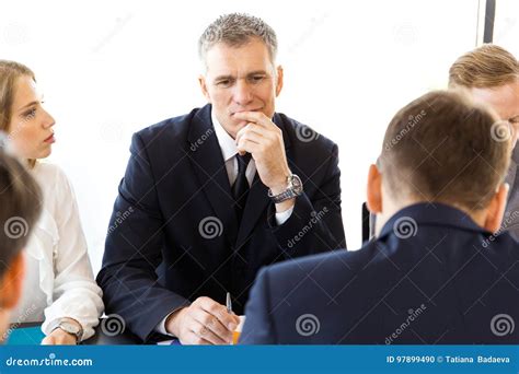 Serious Business People Thinking Stock Photo Image Of Discussing