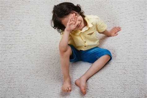 Premium Photo View Of Thoughtful Cute Little Boy Covering His Eyes