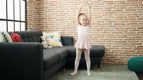 Adorable Blonde Girl Ballerina Smiling Confident Dancing At Home Stock Photo Image Of Happy