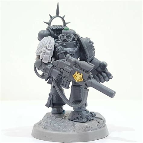 Captain Vordin Krayn, Raven Guard 9th Company Armed with the relic bolter Ex Tenebris and a ...