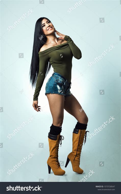 Sexy Latina Light Blue Background Foto De Stock 1573728547 Shutterstock