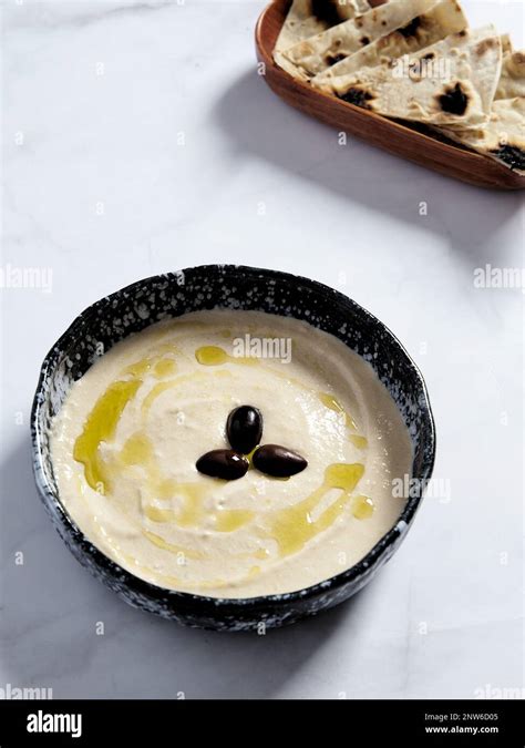 Taramasalata In The Bowl With Olive Oil And Black Olive Taramasalata