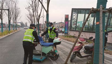 杭州市钱塘区新湾街道：常态化定时巡查 引导居民有序停放非机动车 新华网