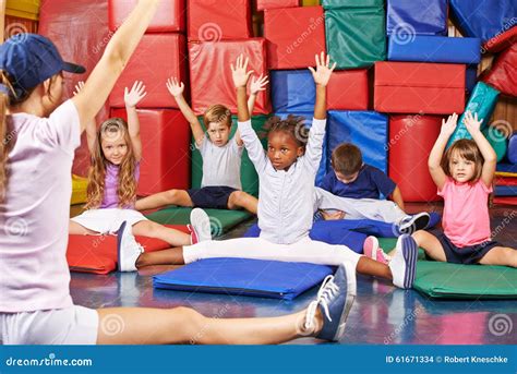 Children Doing Kids Gymnastics In Gym Stock Photo Image Of Elementary