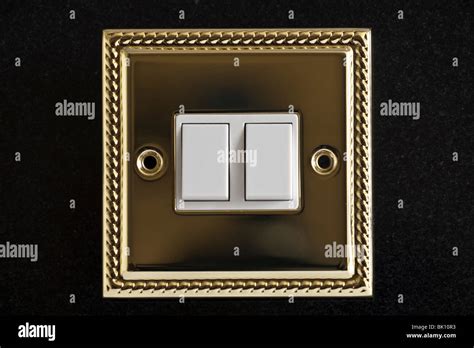 Double Gold Plated Electric Light Switch Stock Photo Alamy