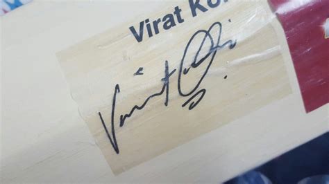virat kohli signature  paper