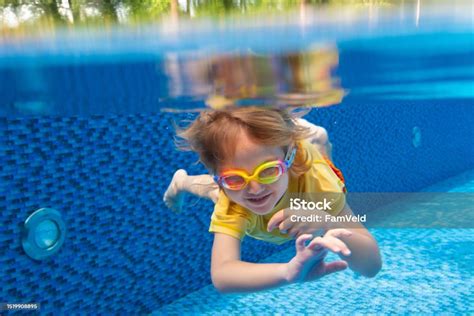 Child Underwater In Swimming Pool Kids Swim Stock Photo - Download ...