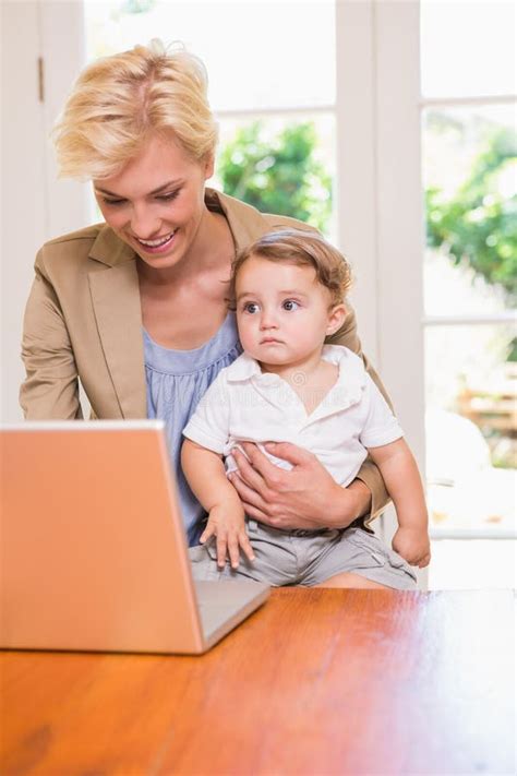 Pretty Blonde Woman His Son Using Laptop Stock Photos Free Royalty Free Stock Photos From