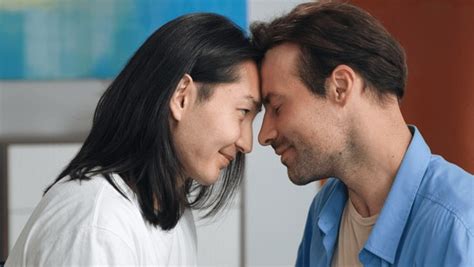 Couple Touching Foreheads Over Royalty Free Licensable Stock