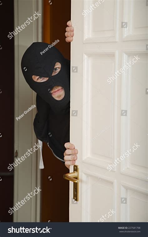 Robber Black Mask Sneaking Inside Stock Photo 227581798 Shutterstock