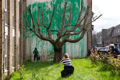 The Meaning Behind Banksys New London Tree Mural The Independent