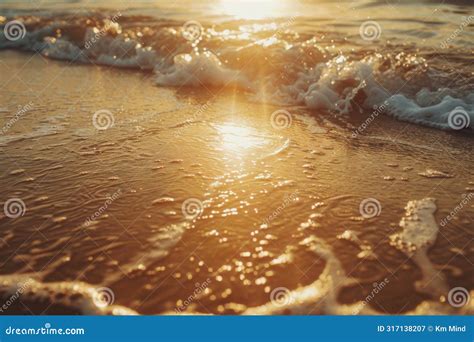 Golden Sunrise Reflecting On Gentle Ocean Waves Stock Photo