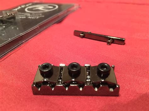 Floyd Rose Br Locking Nut W Matching String Retainer Black Reverb