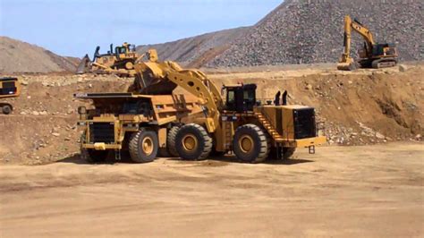 Caterpillar 993K Loads A 785 Haul Truck YouTube