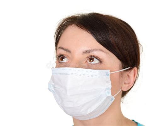 Beautiful Woman Wearing Surgical Mask Isolated On White Background