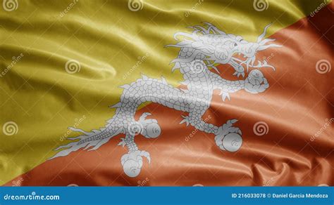 Bhutan Flag Waving In The Wind Close Up Of Butane Banner Blowing Soft