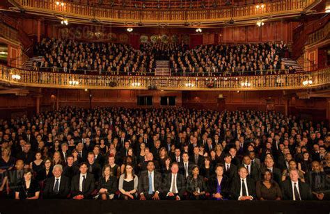 Audience watching performance in theater - Stock Photo - Dissolve