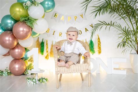 Premium Photo | Cute baby boy kid celebrates his first birthday on the ...