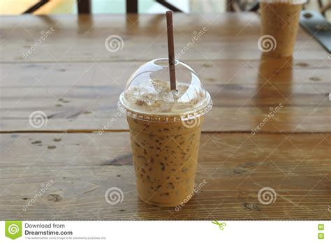 Iced Coffee With Straw In Plastic Cup On Wood Tables Stock Image Image Of Glass Drink 82003609