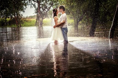 A Couple Kissing in the Rain · Free Stock Photo