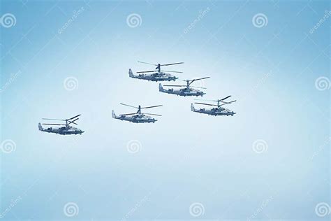 Fighters Flying Helicopters At The Victory Day Military Parade Stock