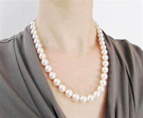 The perfect pearl necklace! Since its hand knotted on silk with top-of ...