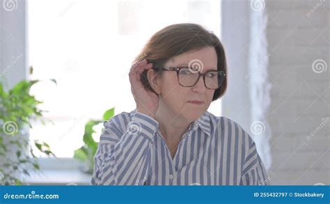 Portrait of Senior Woman Listening Secret Carefully Information Stock ...