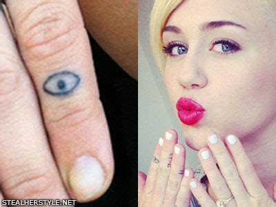 Miley Cyrus' Tattoos & Meanings | Steal Her Style